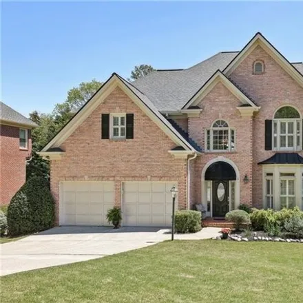 Buy this 6 bed house on 12470 Magnolia Circle in Johns Creek, GA 30005