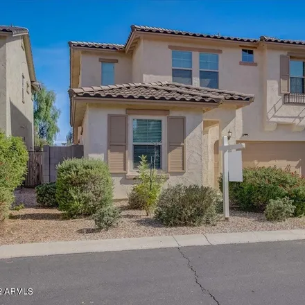 Buy this 4 bed loft on East Laguna Azul Avenue in Mesa, AZ 85209