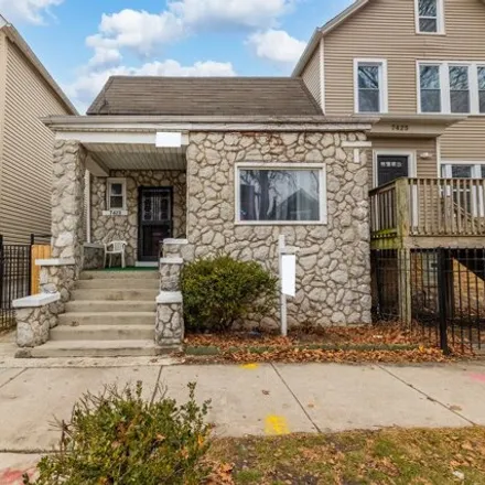Buy this 4 bed house on 7423 South Saint Lawrence Avenue in Chicago, IL 60619