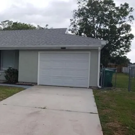 Buy this 3 bed house on 3099 Southwest Longleaf Court in Port Saint Lucie, FL 34953