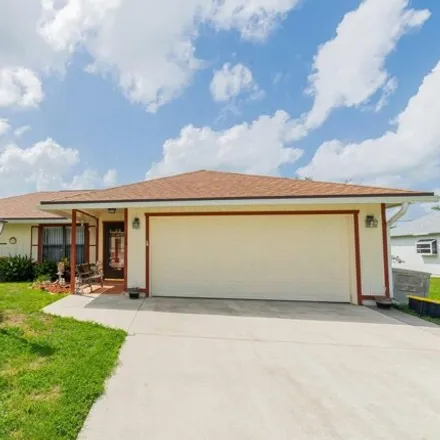 Buy this 3 bed house on 180 Southwest Donna Terrace in Port Saint Lucie, FL 34984