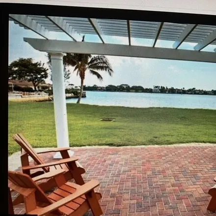 Rent this 3 bed house on 101 Ocean Cay Way in Hypoluxo, Palm Beach County