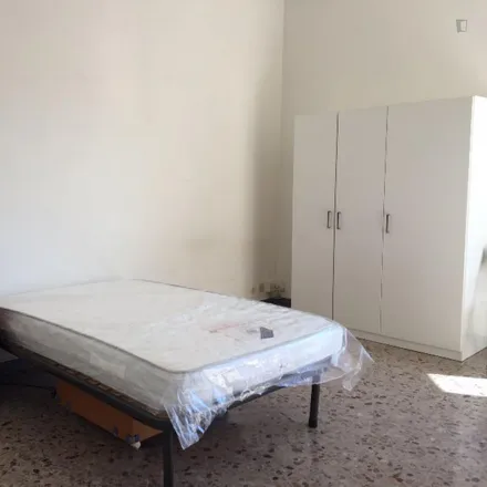 Rent this 3 bed room on Via Ugo Amaldi 10 in 00146 Rome RM, Italy