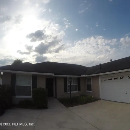 Rent this 3 bed house on 86000 Kensington Court in Yulee, FL 32097