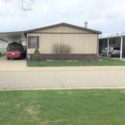 Buy this studio apartment on 12372 Wayfarer Court in Shelby Charter Township, MI 48315