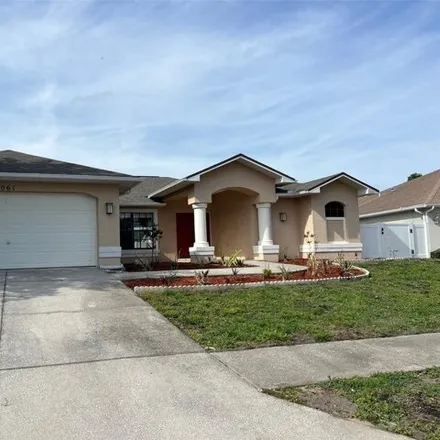 Rent this 4 bed house on 1046 Archway Drive in Spring Hill, FL 34608