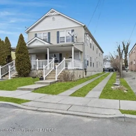 Rent this 4 bed house on 1373 Washington Avenue in Asbury Park, NJ 07712