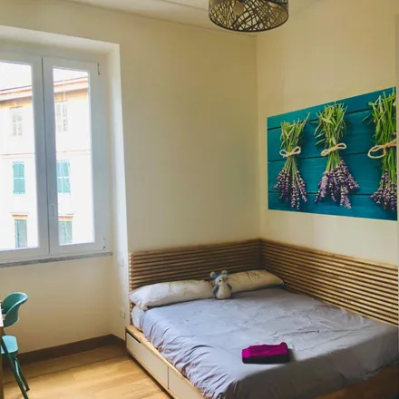 Rent this 3 bed room on Via Giovanni Battista Bodoni in 00153 Rome RM, Italy