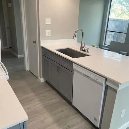Rent this 1 bed apartment on 7698 Holly Hill Drive in Dallas, TX 75231