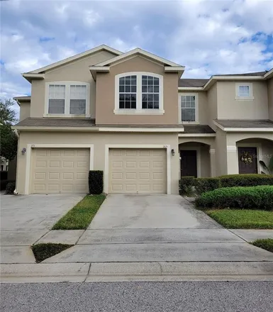 Buy this 3 bed townhouse on 165 Angel Trumpet Way in Oviedo, FL 32765