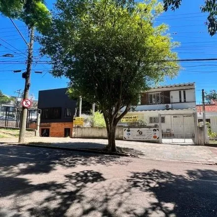 Buy this 3 bed house on Rua João Bastian in Três Figueiras, Porto Alegre - RS