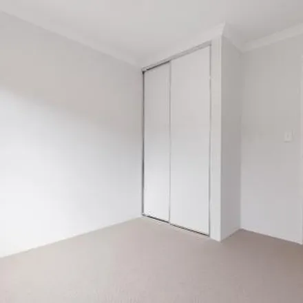 Rent this 4 bed apartment on 44 Selacosa Avenue in Alkimos WA 6038, Australia