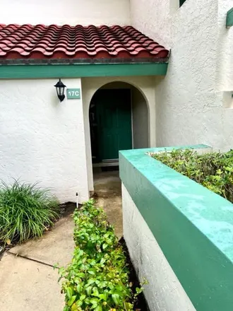 Buy this 2 bed townhouse on 17 Lexington Lane West in Palm Beach Gardens, FL 33418