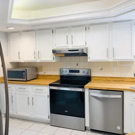 Rent this 3 bed apartment on 4304 Hazel Avenue in Palm Beach Gardens, FL 33410