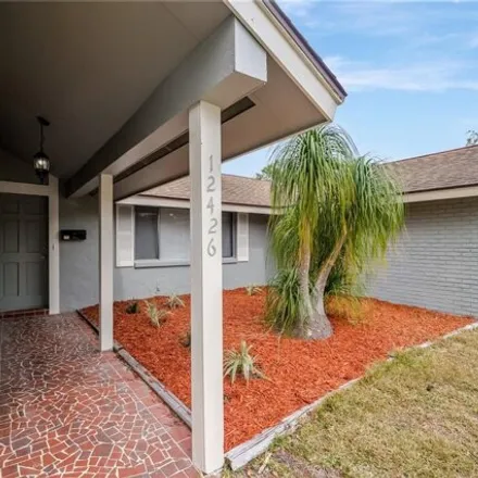 Buy this 3 bed house on 12456 Cobblestone Drive in Bayonet Point, FL 34667