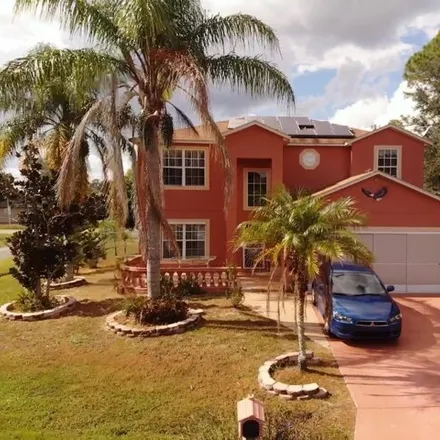 Buy this 4 bed house on 901 South Rennes Court in Poinciana, FL 34759