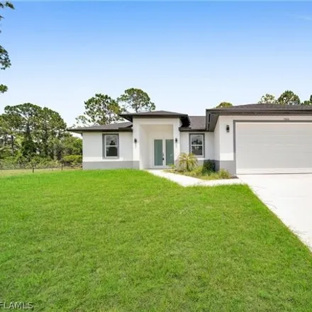 Buy this 3 bed house on 1500 Sunniland Blvd in Lehigh Acres, Florida