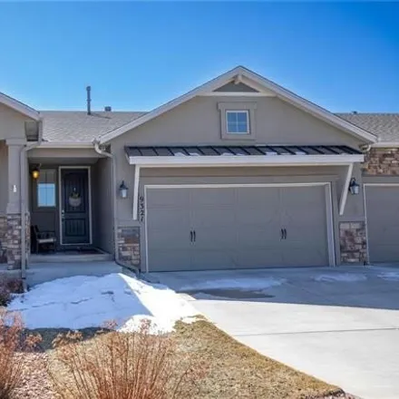 Buy this 4 bed house on 9321 Kathi Creek Drive in Colorado Springs, CO 80924