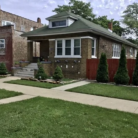 Buy this 4 bed house on 9215 South Greenwood Avenue in Chicago, IL 60619