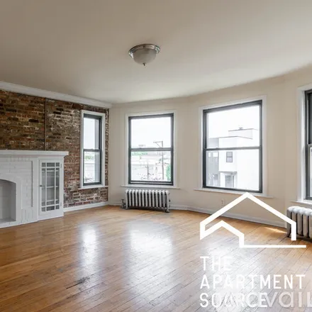 Rent this 3 bed apartment on 2330 N Spaulding Ave