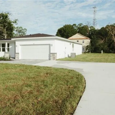 Buy this 4 bed house on 3564 Plumosa Drive in Polk County, FL 33898