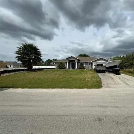 Buy this 4 bed house on 527 Hamwood Street in Palm Bay, FL 32908