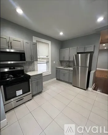 Rent this 4 bed apartment on 82 Fulton Avenue
