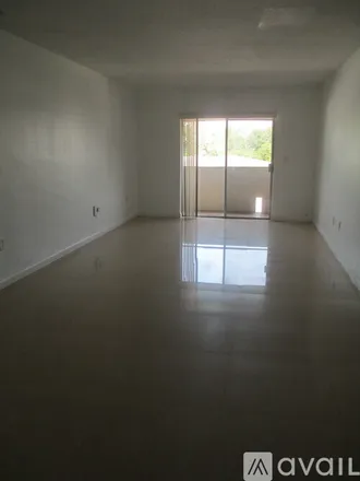 Rent this 2 bed apartment on 7430 SW 59th Ct