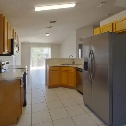 Rent this 3 bed apartment on 981 Yellowbird Avenue in Deltona, FL 32725