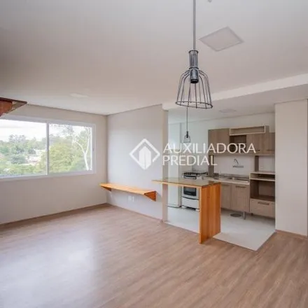 Buy this 3 bed apartment on Casa Mia Pizzaria in Avenida Bento Gonçalves 8819, Lomba do Pinheiro