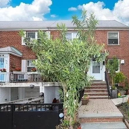 Buy this 6 bed townhouse on 65-34 Utopia Parkway in New York, NY 11365