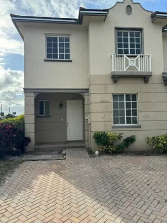 Rent this 4 bed townhouse on 2099 Nassau Drive in Riviera Beach, FL 33404