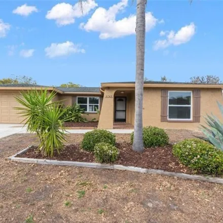 Buy this 3 bed house on 5701 Consuello Drive in Elfers, FL 34690
