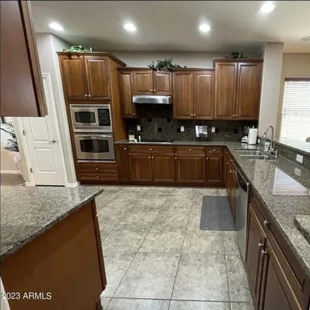Rent this 4 bed house on 27443 North 90th Lane in Peoria, AZ 85383