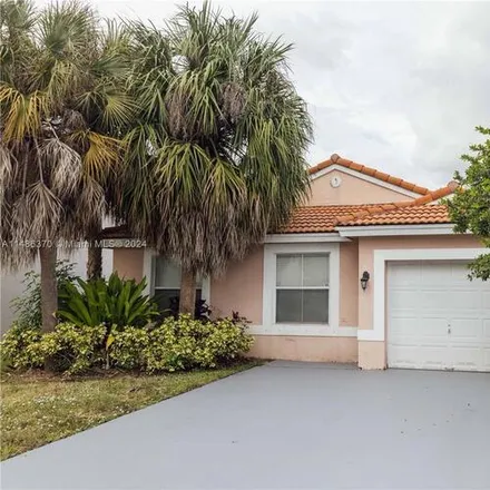 Rent this 3 bed house on 20881 NW 18th St
