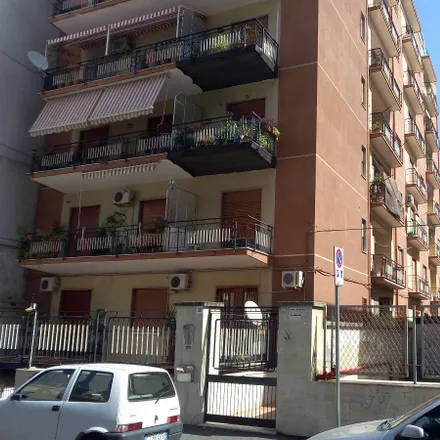 Rent this 3 bed room on Istituto comprensivo Armando Diaz-Alessandro Manzoni - plesso Basile in Via Gioacchino Basile, 95124 Catania CT