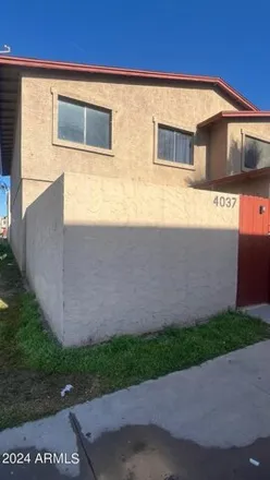 Buy this 2 bed townhouse on 4037 West Palomino Road in Phoenix, AZ 85019