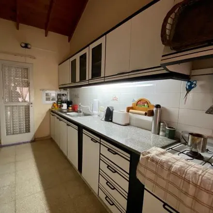 Buy this 4 bed house on Calle 74 1003 in Rufino de Elizalde, 1900 Altos de San Lorenzo