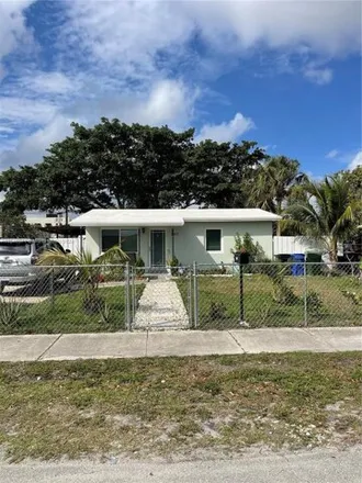 Rent this 3 bed house on 2579 Northwest 18th Court in Rock Island, Fort Lauderdale