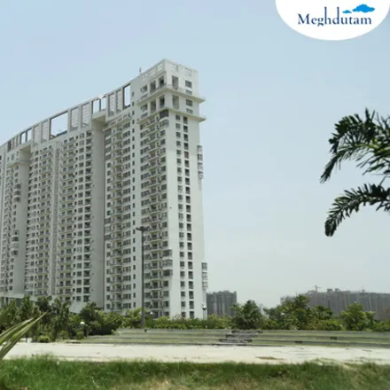 Rent this 3 bed apartment on meghdootam pond with fountains. in Barola Byepass, Noida City Centre