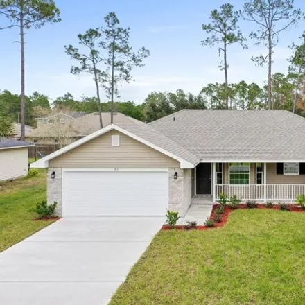 Buy this 3 bed house on 8 Persimmon Dr in Palm Coast, Florida