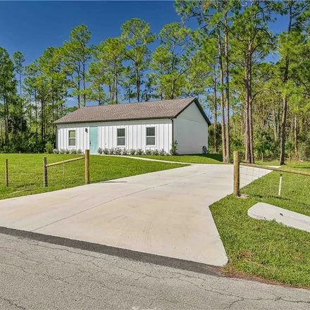 Buy this 3 bed house on 3200 East 22nd Street in Lehigh Acres, FL 33920