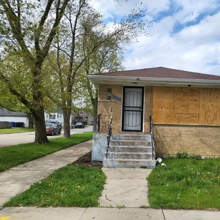 Buy this 3 bed house on 2058 West 70th Place in Chicago, IL 60636