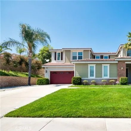 Rent this 5 bed house on 15134 Willow Wood Lane in Fontana, CA 92336