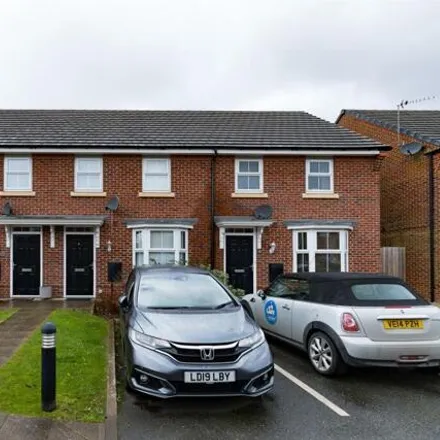 Rent this 3 bed townhouse on Rose Creek Gardens in Chapelford, Warrington