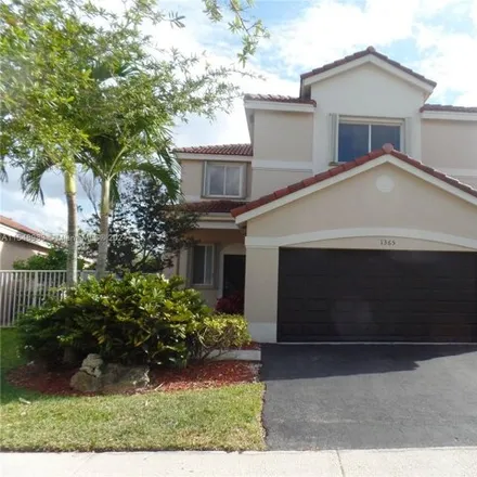 Rent this 4 bed house on 1365 Majesty Terrace in Weston, FL 33327
