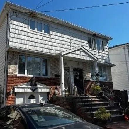 Buy this 4 bed house on 2337 East 72nd Street in New York, NY 11234