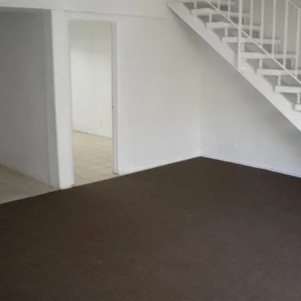 Rent this 4 bed townhouse on 5862 Lewis Avenue in Long Beach, CA 90805