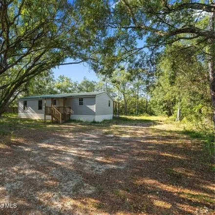 Buy this 3 bed house on 5114 West Rochelle Street in Homosassa Springs, FL 34446