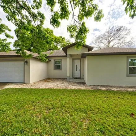 Buy this 4 bed house on 2731 Tropic Road in Melbourne, FL 32935